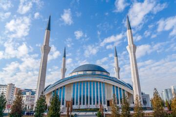 Fototapeta na wymiar Ahmet Hamdi Akseki Mosque (Camii, cami) with blue sky background.