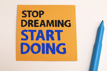 Stop dreaming start doing, text words typography written on paper, life and business motivational inspirational