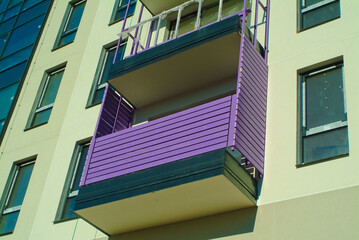 RIGA, LATVIA-January 27, 2021: modern apartment building with purple balconies