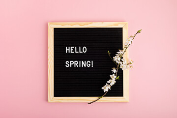 Felt letter board with hello spring message. Springtime welcome concept. Flat lay, top view