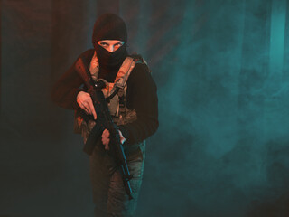 Special forces soldier on a background of smoke