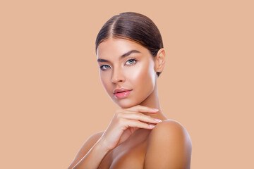 Beautiful Portrait Of Young Woman. Advertisement. Perfect Skin Face, Girl Touches her Face with her...