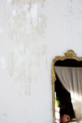 White shell nacre chandelier and mirror