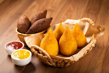 Coxinha of chicken with kibbeh, Traditional brazilian snack.