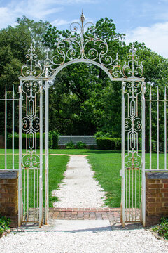 White iron gate in a garden