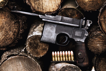Old German pistol on a wooden background. Police type pistol in 9mm caliber