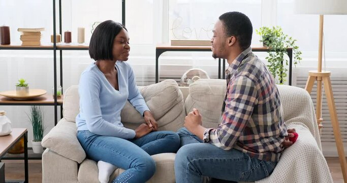Woman rejecting proposal of man at home