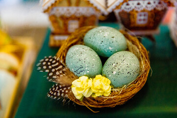 Easter eggs in a wicker nest. happy Easter.