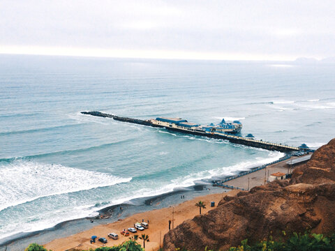 A pier in the ocean of Lima, Per&uacute;.