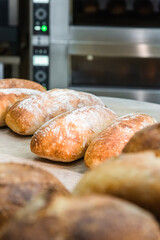 Craft bread on the table at the bakery. The concept of small industries and healthy food