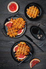 Waffle breakfast with grapefruit and coffee