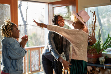 Friends gathering together for self care retreat at home