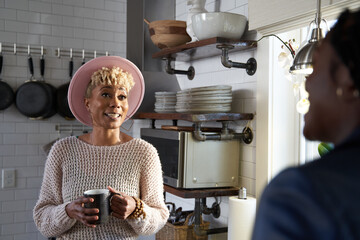 Black girlfriends having a conversation during self care retreat