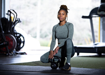 Fitness portrait of African American woman in gym