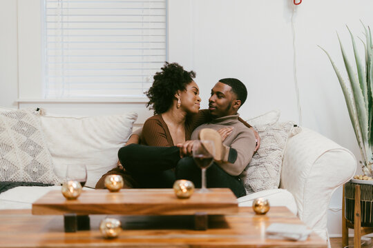 Intimate coversation, black couple at home