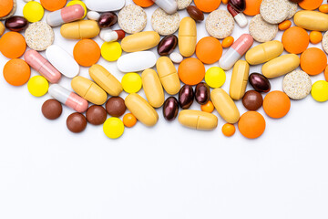 medication drugs frame isolated on white background. above view. border for design. various pills and tablets