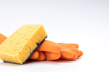 toilet cleaning concept. rubber gloves, cleaning sponge and wc gel freshener applicator on white background