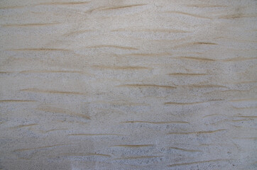 rough plaster facade painted white as a texture or background