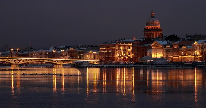 The panoramic footage of the winter night city Saint-Petersburg, Blagoveshchensky Bridge, the bridge of the lieutenant Schmidt, a night motionless panorama, St. Isaac's Cathedral, Palace Bridge