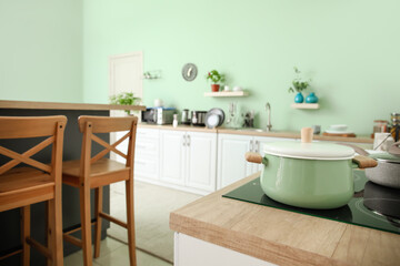 Cooking pot on kitchen stove
