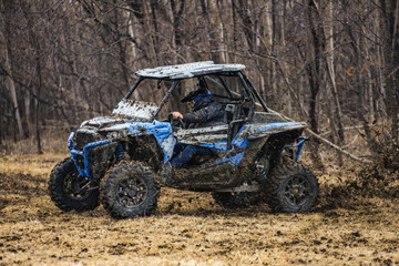 ATV adventure. Buggy extreme ride on dirt track. UTV