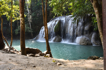 Fototapeta na wymiar Limestone Erawan waterfall in the forest in Erawan National park, Kanchanaburi, Thailand 