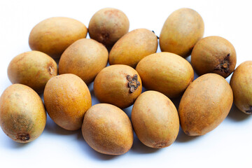 Fresh sapodilla fruit isolated on white