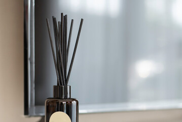 The reed diffuser is placed on the table for a soothing scent that creates a pleasant atmosphere in the house during periods of detention.