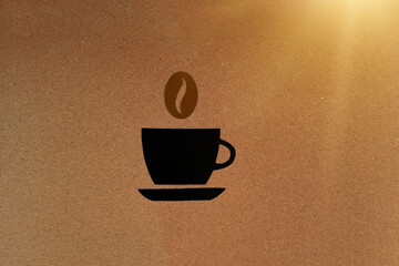 A cup of black coffee, coffee grain on a cork background. Breakfast, wake up. a hot drink.