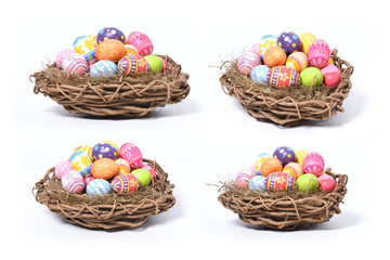 Fototapeta na wymiar Happy Easter day colorful eggs in nest isolated collection on white background