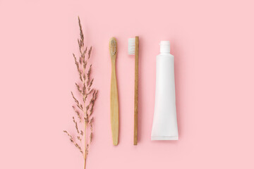 Set of eco-friendly toothbrushes, toothpaste and other tools on pink background. Dental and healthcare concept. Top view, flat lay. - 417508638