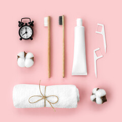 Set of eco-friendly toothbrushes, toothpaste and other tools on pink background. Dental and healthcare concept. Top view, flat lay. - 417508659