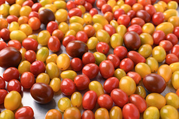 Fresh colorful tomatoes, Food background