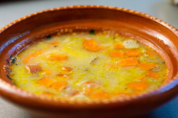 Chicken soup country style soup in bowl