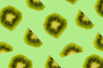 Fototapeta premium seamless regular pattern or background with kiwi fruit, levitation food