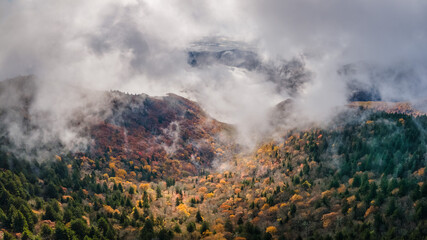 Dramatic autumn weather - with clouds, fog and sun - in the Blue Ridge Mountains