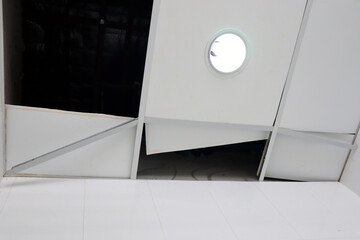 The ceiling was broken due to rain stormy winds. The ceiling was destroyed, waiting to be repaired by skilled technicians. Used for construction to protect the head. Architecture and engineering work.
