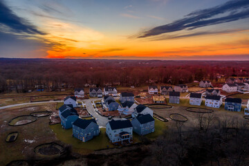 Colorful sunset over a new American neighborhood