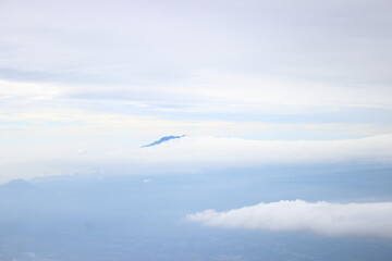 Fototapeta premium airplane flying over the clouds