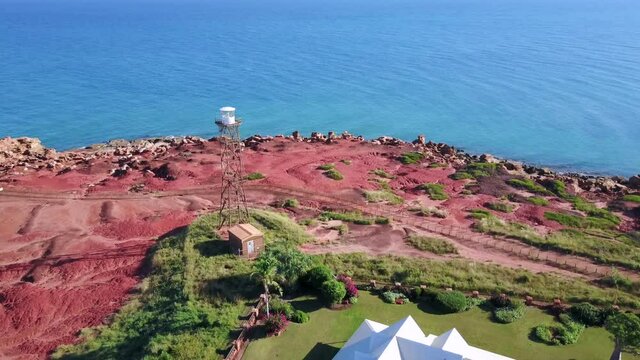 Iron Lighthouse Standing On Red Landscape By The Sea Shore In Cape Leveque, Northernmost Tip Of Dampier Peninsula In Kimberley, WA. Aerial Drone (orbit)