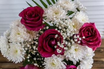 Bouquet of flowers Pink roses and white chrysanthemums