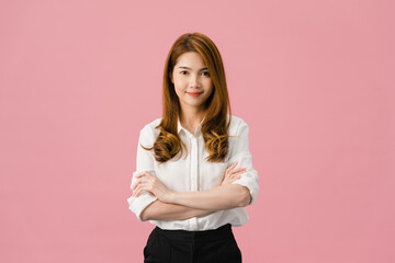 Portrait of young Asia lady with positive expression, arms crossed, smile broadly, dressed in casual clothing and looking at camera over pink background. Happy adorable glad woman rejoices success.