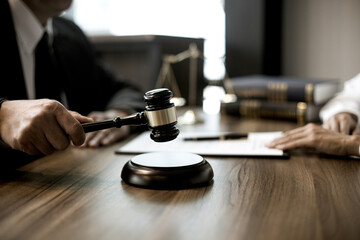 Focus on gavel and scales on the table background Lawyer or judge are discussion