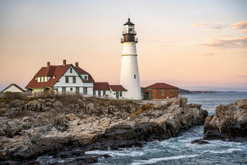 Fototapeta na wymiar Working lighthouse on a cliff on the Atlantic coast in Maine