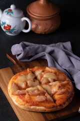 Three american style pizzas, Hawaiian thick crust pizza