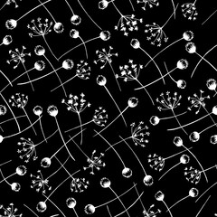 Small white plants on a black background. Seamless vector pattern