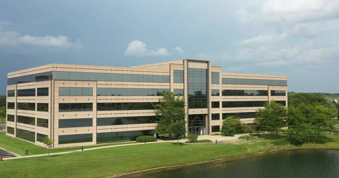 Office building in a suburban setting with pond