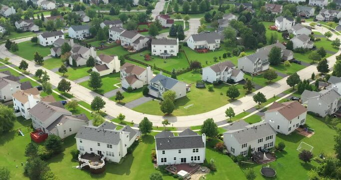 Aerial view of an upscale neighborhood in suburban Chicago during summer.