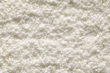 Tasty coconut flakes as background