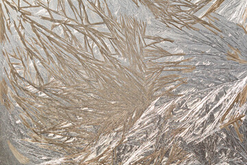 Obraz premium Winter snowy frosty patterns on the glass window. Winter magic. Frosty wonders. Abstract patterns.